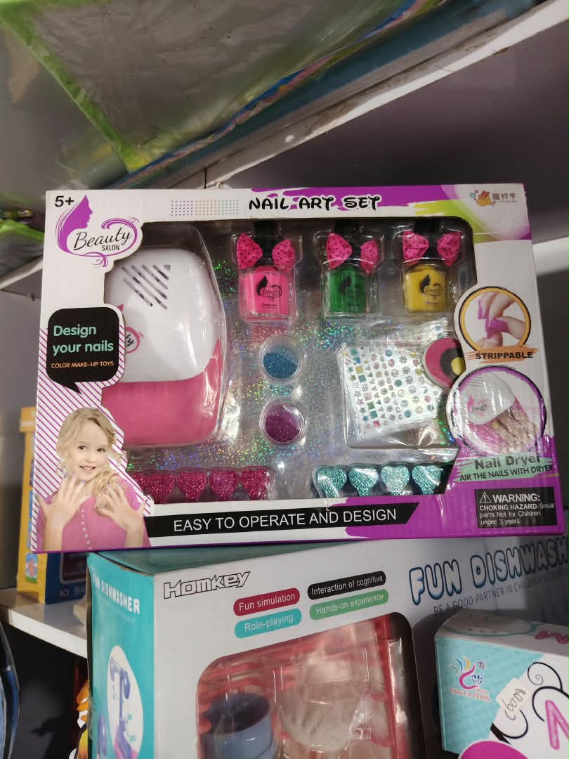 all-terrain-remote-control-stunt-crawler-nbk-out-129 Beauty Salon Nail Art Studio Set with Battery-Powered Nail Dryer & Strippable Polishes - Image 1