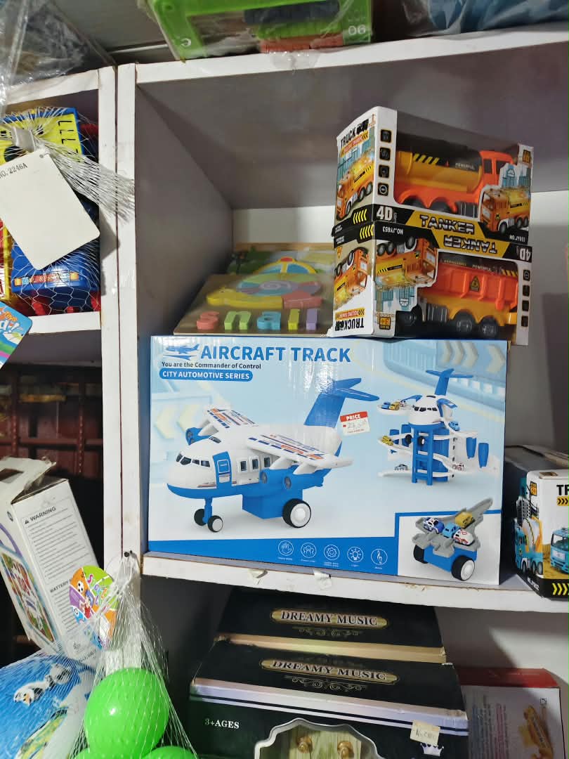 electronic-coin-eating-piggy-bank-safe-nbk-toy-116 City Automotive Series Transformable Cargo Airplane Playset with Diecast Mini Cars - Image 1