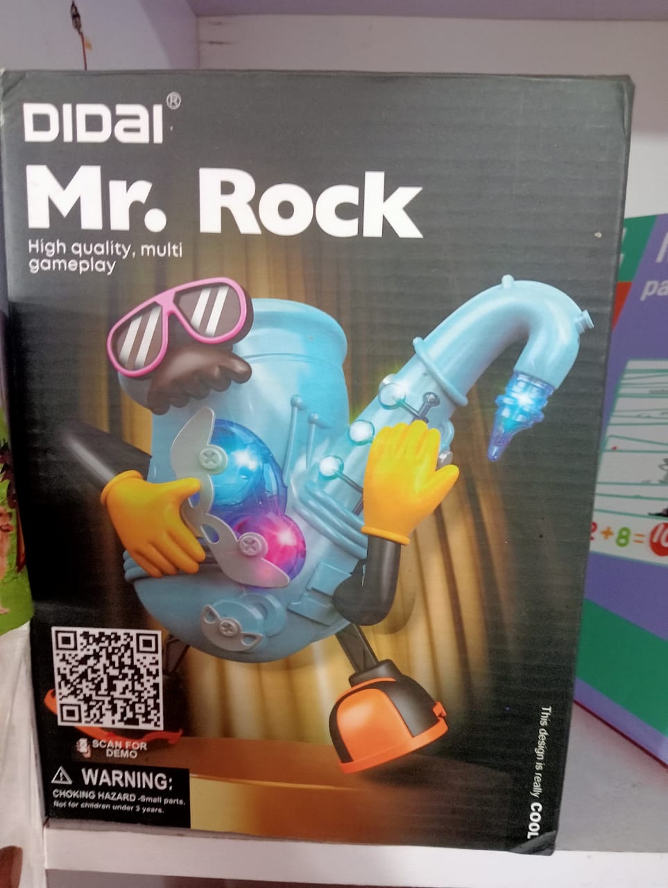 soft-plush-talking-hamster-repeats-what-nbk-toy-061 DIDAI Mr. Rock Dancing & Singing Musical Saxophone with 3D Lights - Image 1